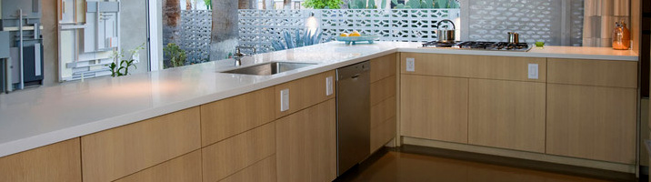 Specialising In - Doors, Windows, Custom mouldings, Wood turning, Kitchens, Wardrobes, and Corian worktops